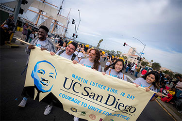 https://www.resilientheartsjournal.com/wp-content/uploads/2025/03/mlk-parade-2020.jpg